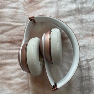 Beats rose gold headphones with case